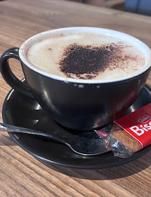 Cappuccino dusted with chocolate powder